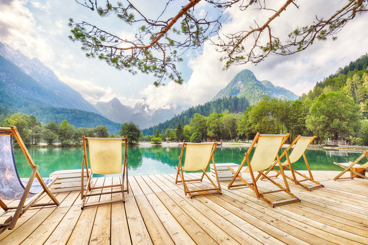 Incredible landscape on Jasna lake with beautiful reflections of the mountains. Nature scenery in Triglav national park. Location: Triglav national park. Kranjska Gora, Slovenia, Europe.